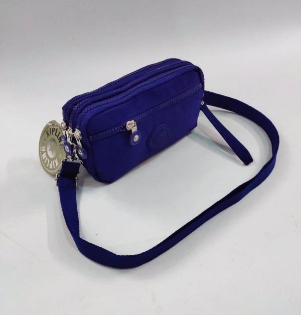 Purple three zipper purse, Runner Street
